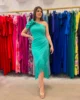 Vestido de fiesta midi con flecos asimétrico