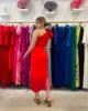Vestido de fiesta midi con flecos asimétrico