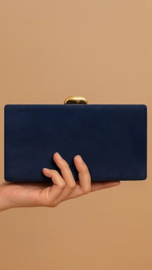 Bolso clutch de antelina azul marino