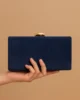 Bolso clutch de antelina azul marino
