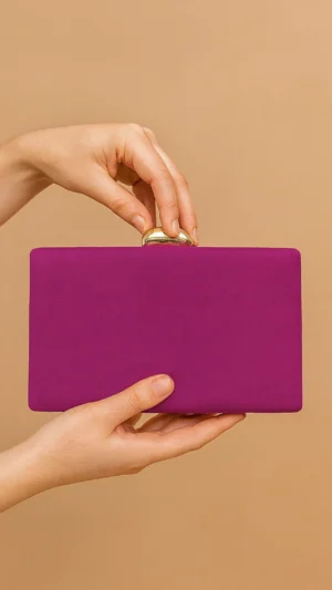 Bolso clutch de antelina fucsia