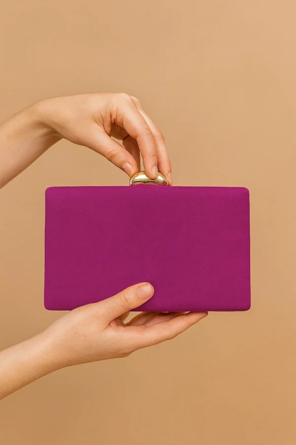 Bolso clutch de antelina fucsia