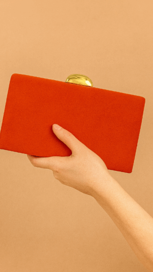 Bolso clutch de antelina naranja