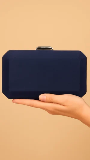Bolso clutch de antelina azul marino con cierre plata