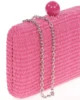 Bolso clutch de rafia fucsia con cierre de bola