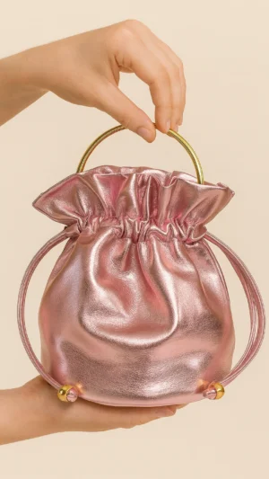 Bolso bombonera metálica rosa