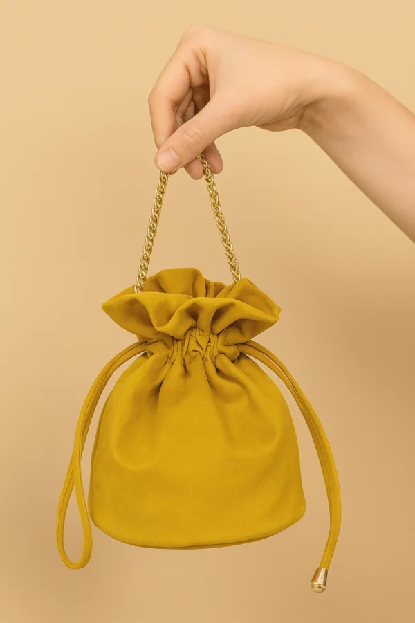 Bolso bombonera de antelina mostaza