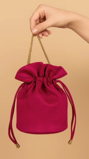 Bolso bombonera de antelina fucsia