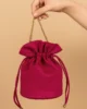 Bolso bombonera de antelina fucsia