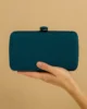 Bolso clutch de tela azul petroleo