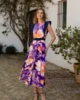 Vestido midi estampado con falda de vuelo y espalda abierta