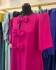 Vestido fluido con lazos Vestido fluido con lazos