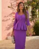 Vestido midi morado con peplum Vestido midi morado con peplum