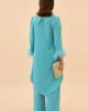 Conjunto de pantalón turquesa con cuello vuelto Conjunto de pantalón turquesa con cuello vuelto