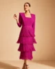 Vestido midi fucsia con falda de flecos Vestido midi fucsia con falda de flecos