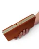 Bolso clutch de antelina teja con doble cadena Bolso clutch de antelina teja con doble cadena