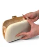 Bolso clutch redondeado beige de antelina Bolso clutch redondeado beige de antelina