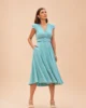 Vestido midi verde con falda de vuelo y manga corta Vestido midi verde con falda de vuelo y manga corta