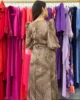 Vestido midi estampado de gasa con lúrex y manga abullonada Vestido midi estampado de gasa con lúrex y manga abullonada