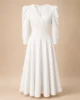 Vestido midi de crepé blanco con falda de capa Vestido midi de crepé blanco con falda de capa