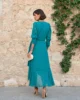 Vestido de gasa verde petróleo con flocado en zig zag Vestido de gasa verde petróleo con flocado en zig zag