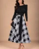 Conjunto negro de falda midi estampada y top multiposición Conjunto negro de falda midi estampada y top multiposición