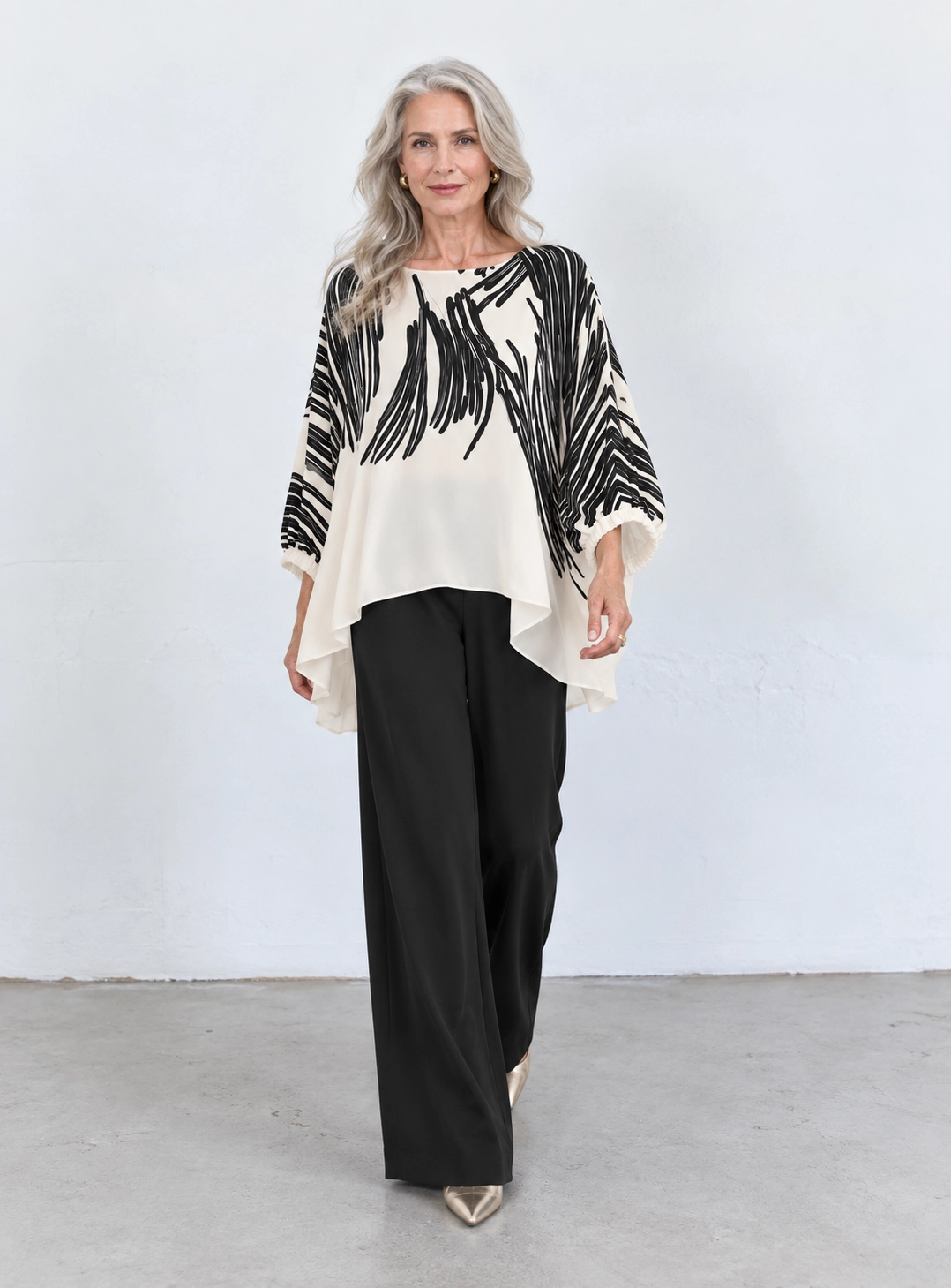 26174 (1) copia Conjunto negro de pantalón ancho y blusón estampado