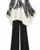Conjunto negro de pantalón ancho y blusón estampado Conjunto negro de pantalón ancho y blusón estampado